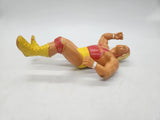 WWF action figure: Hulk Hoggan, Red Shirt Titan Sports, Hulkamania LJN 1988.