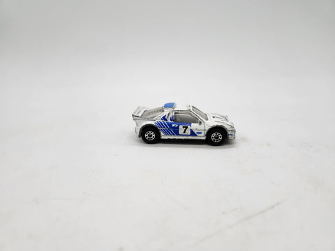 Vintage 1986 Matchbox #7 Ford RS-200 Rally Car #34 White/Blue 1:55 Diecast.