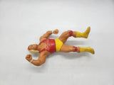 WWF action figure: Hulk Hoggan, Red Shirt Titan Sports, Hulkamania LJN 1988.