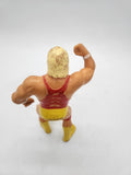 WWF action figure: Hulk Hoggan, Red Shirt Titan Sports, Hulkamania LJN 1988.
