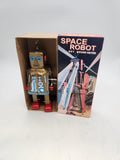 Space Robot Tin Toy key wound Gold.