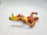 WWF action figure: Hulk Hoggan, Red Shirt Titan Sports, Hulkamania LJN 1988.