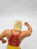WWF action figure: Hulk Hoggan, Red Shirt Titan Sports, Hulkamania LJN 1988.