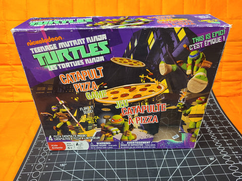 Teenage Mutant Ninja Turtles Catapult Pizza Board Game Toy Nickelodeon.
