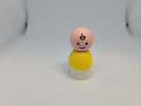 Fisher Price Vintage Little People Baby with yellow bib.